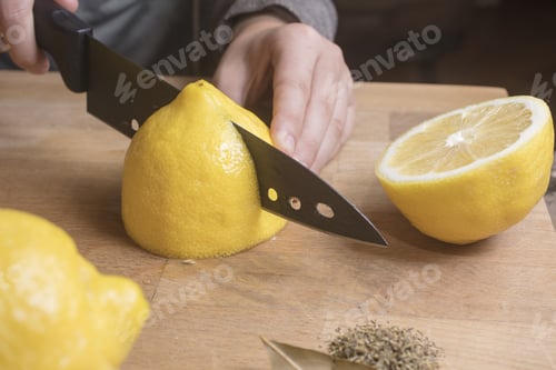 Preview: Person Making Salted Preserved Lemons, By Cutting And Spicing