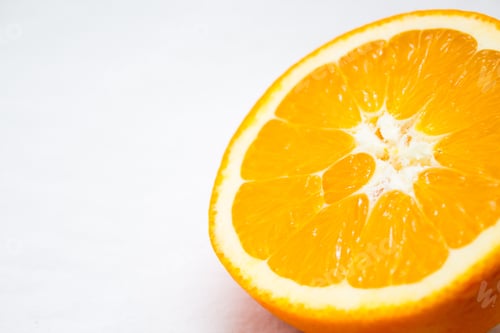 Preview: Half Of A Orange On A White Background