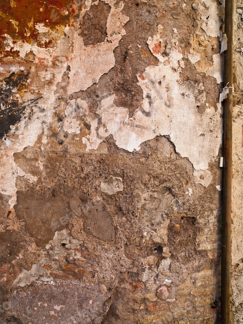 Vista previa: A Well Worn Wall Showing Many Textures