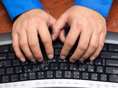Preview: Close-Up Cropped Shot Of A Human Hands Typing On Black Keyboard.