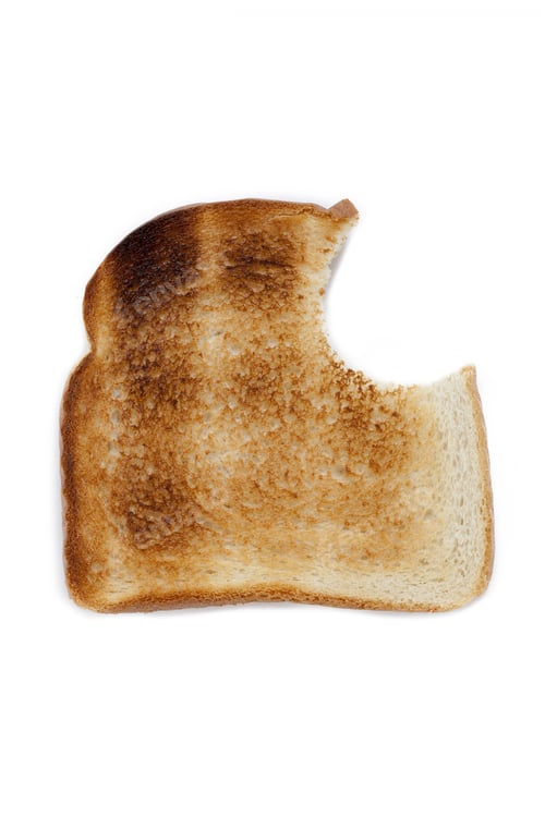 Toasted Slice of Bread with a Bite Mark