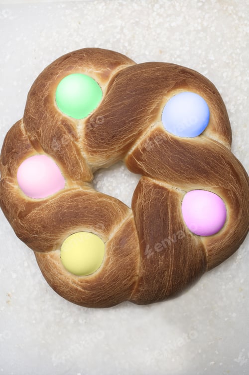 Preview: Braided Easter Bread On A Cutting Board Decorated With Baked Eggs