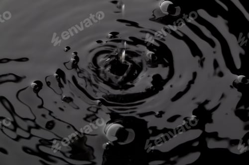 Preview: Close Up Water Droplet Affect The Surface, Forming Rings On The Surface And Making A Perfect