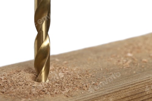 Preview: Drilling A Hole In A Piece Of Wood In A Close-Up Image