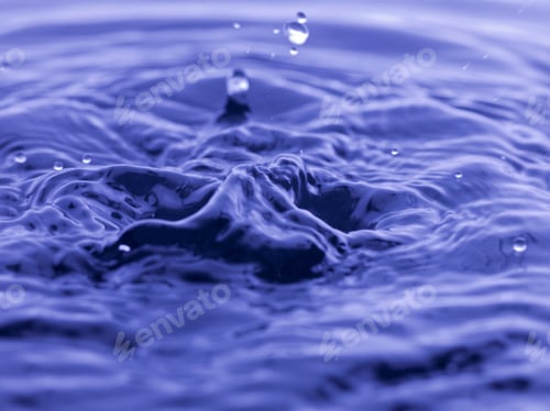 Preview: Water Drop Falling Into Blue Water Abstract Background