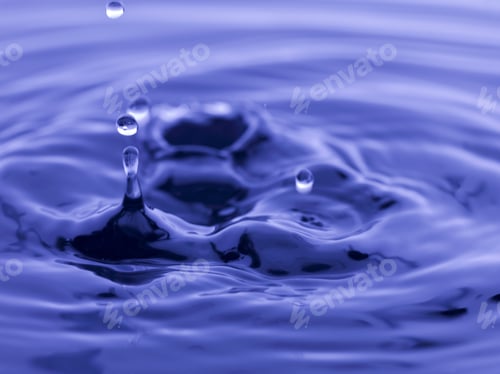 Preview: Water Drop Falling Into Blue Water Abstract Background