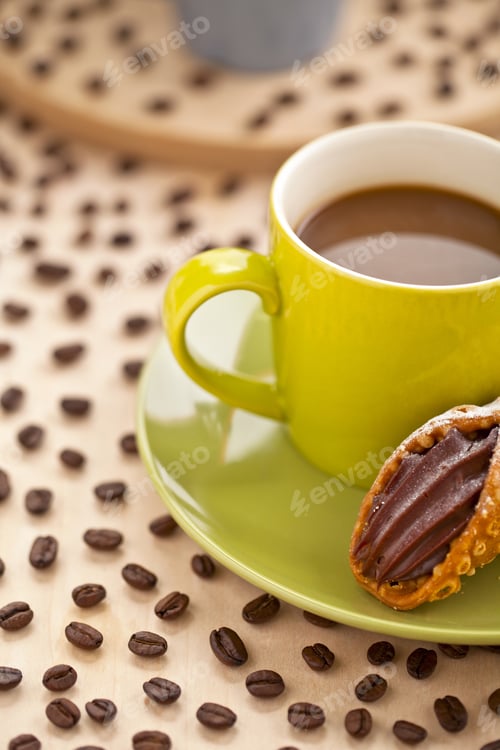 Preview: Cropped Image Of Hot Chocolate And Toasted Bread On Green Plate Place On A Table With Coffee Beans