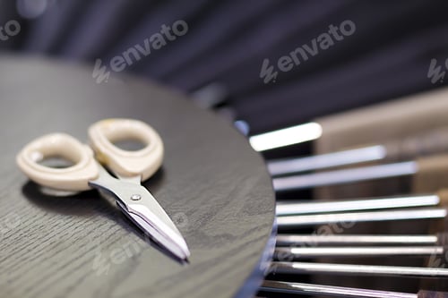 Preview: Business Suits On The Rack With A Pair Of Seamstress Scissors In Foreground