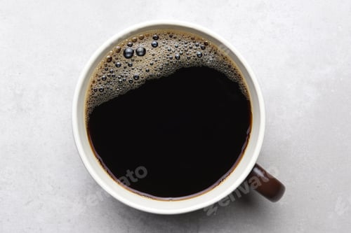 Preview: Black Coffee In Brown Mug On Light Gray Tile