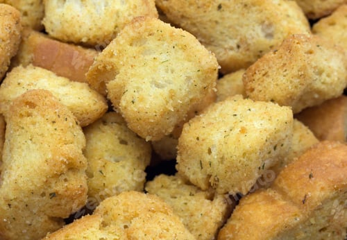 Preview: A Close View Of Large Seasoned Croutons.