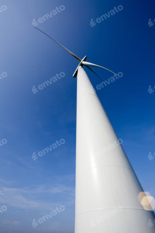 Preview: Detailed View Of A Wind Turbine With Clear Sky In The Background.