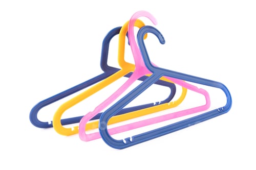 Preview: A Group Of Colorful Plastic Clothes Hangers Isolated On White