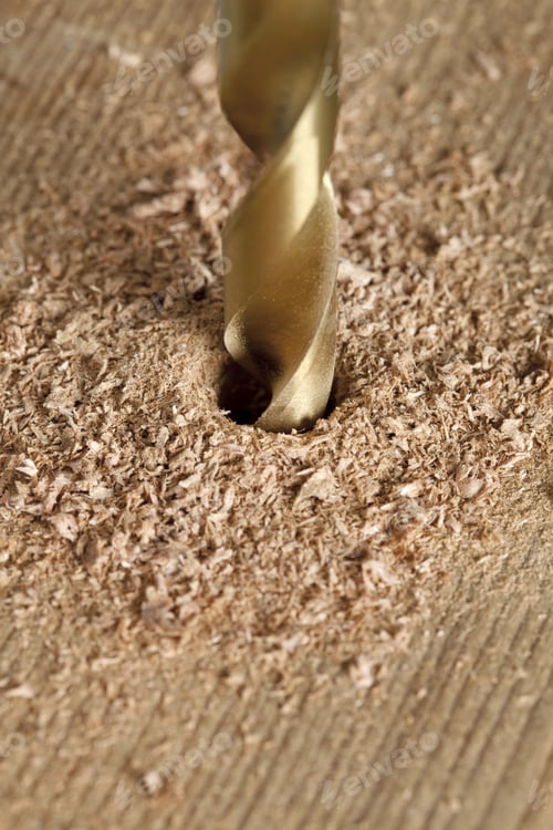 Preview: Close Up Image Of Drilling A Hole In A Wood Plank
