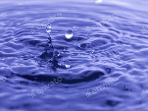 Preview: Water Drop Falling Into Blue Water Abstract Background