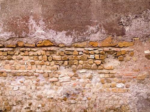 Vista previa: Gráfico de textura de una antigua pared toscana con ladrillos expuestos.