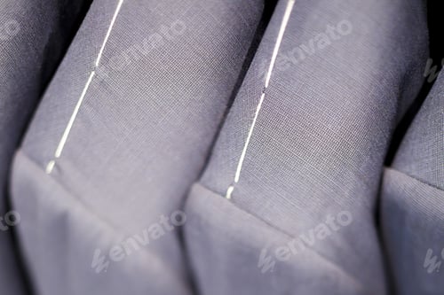 Preview: Close-Up Of Grey Suits.