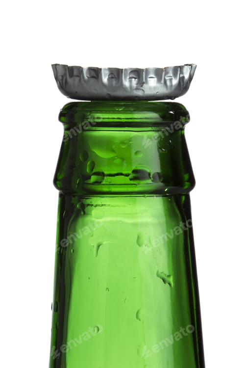 Preview: Close-Up Cropped Shot Of Empty Green Bottle With Cap.