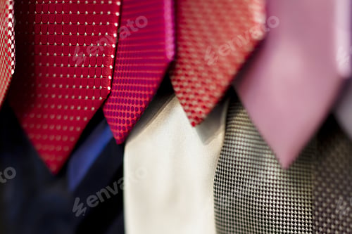 Preview: Colorful Men'S Ties Hanging In A Rainbow Of Pink And Purple Hues
