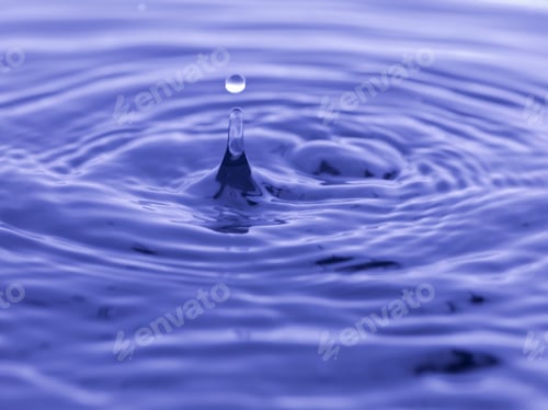 Preview: Water Drop Falling Into Blue Water Abstract Background