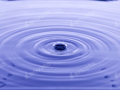 Preview: Close Up Water Droplet Affect The Surface, Forming Rings On The Surface And Making A Perfect