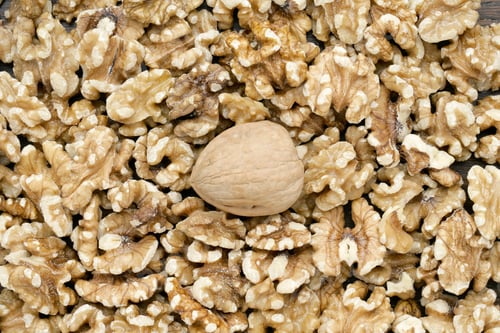 Preview: Walnut With Shell Isolated Over The Peeled Walnuts