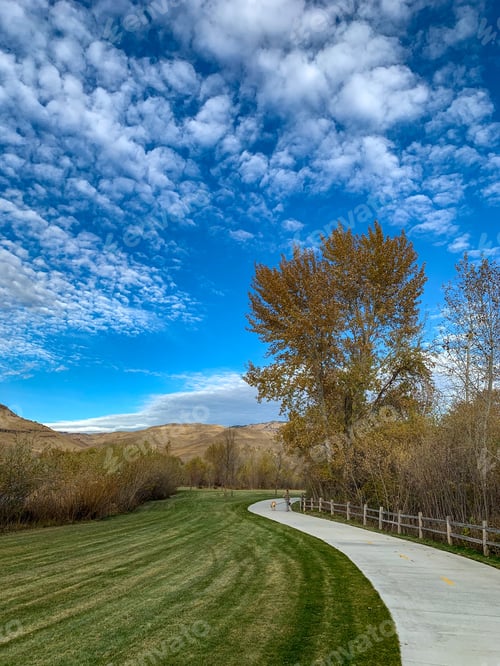Preview: Woman And Her Dogs On The Greenbelt In Boise, Idaho