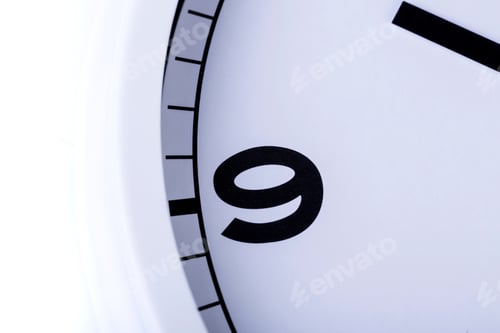 Preview: Close Up Quarter Of An Analog Clock Showing The Hour Of Nine