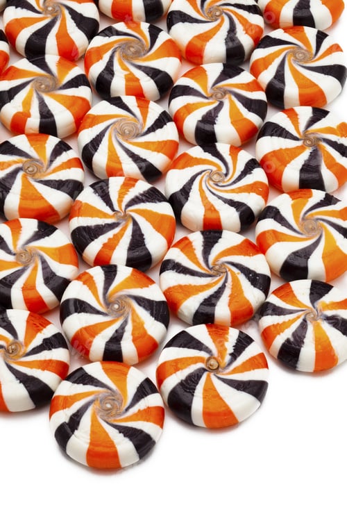 Preview: Detailed View Of Colorful Hard Candies Arranged Over Plain White Background.