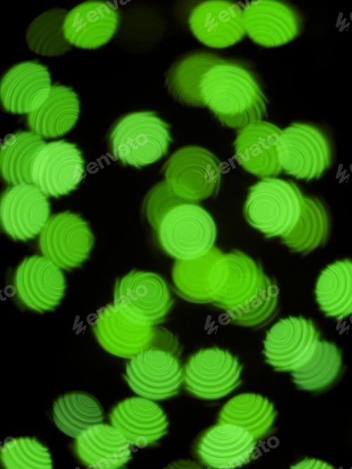 Preview: Green Abstract Circular Lights Blurred Bokeh Holiday Background Of Christmas Light