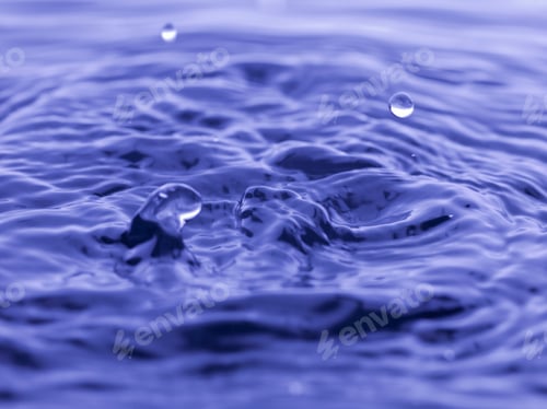 Preview: Water Drop Falling Into Blue Water Abstract Background