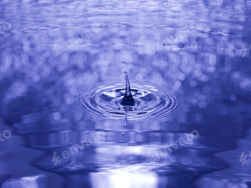 Preview: Close Up Water Droplet Affect The Surface, Forming Rings On The Surface And Making A Perfect