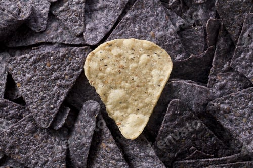 Preview: Yellow Chip Placed On Top Of Blue Nacho Chips