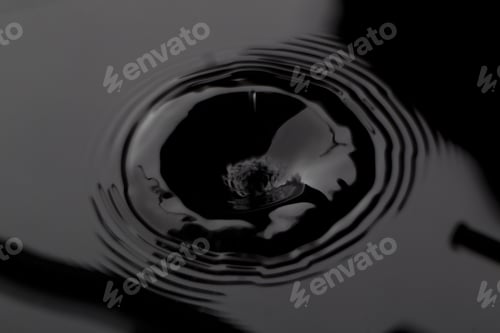 Preview: Close Up Water Droplet Affect The Surface, Forming Rings On The Surface And Making A Perfect