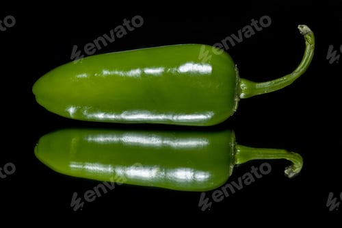 Preview: Fresh Hot Peppers Isolated On Black Background