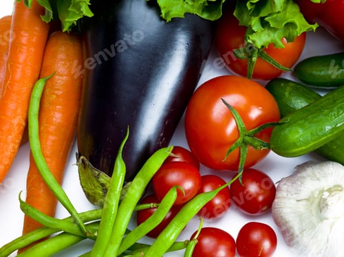 Preview: Various Vegetables Together On A White Surface.