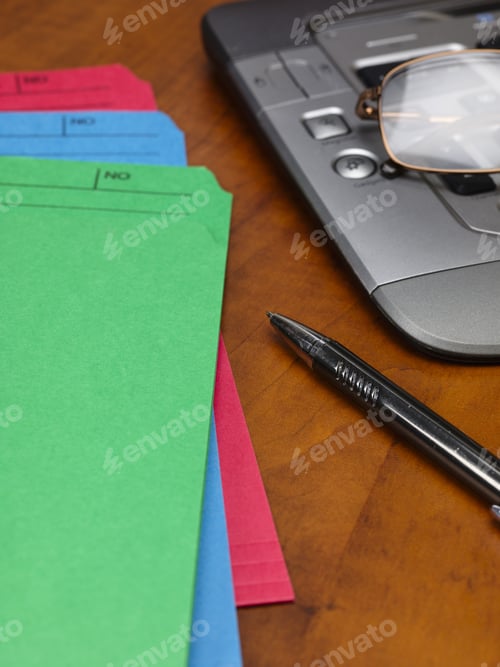 Preview: File Folders And Papers On Office Desktop
