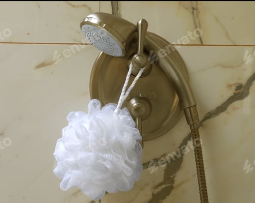 Preview: A Shower Stall Control Handle With Hand Held Shower Head And Cloth Loofah