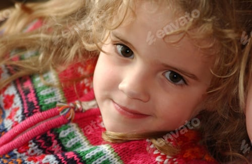Preview: Young Girl Grinning Looking At Camera,