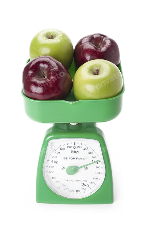 Preview: Red And Green Apples Measured In A Green Weighing Scale.