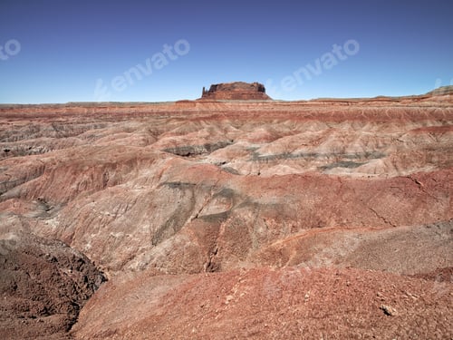 Preview: Image Of A Sandstone Cliff Against Clear Sky.
