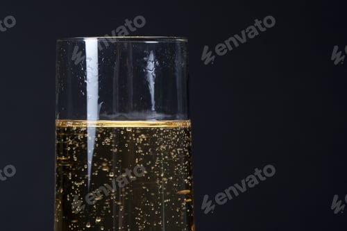 Preview: Champagne Glass Detail On Black Background