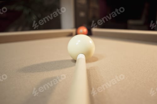 Preview: Close-Up Shot Of Pool Stick And Cue Ball Aiming At Orange Ball.