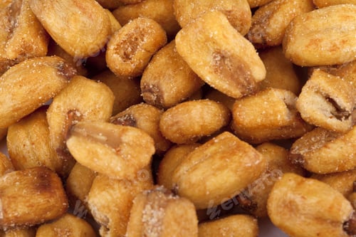Preview: Close-Up Image Of Roasted Peanuts On A White Background