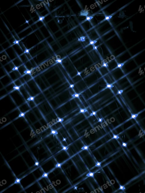 Preview: Defocused Image Of Blue Halloween Lights Over Black Background.