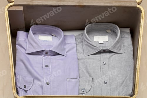 Preview: Folded Men's Shirts Stored in Vintage Suitcase