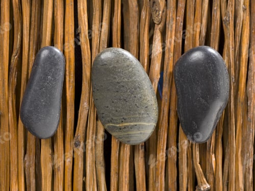 Preview: Close-Up Image Of Spa Stones Lying Wooden Bamboo Sticks