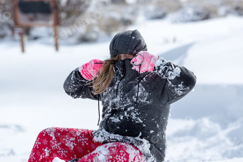 Preview: Child Peeping Out Of Drawn Hood While Playing In The Snow