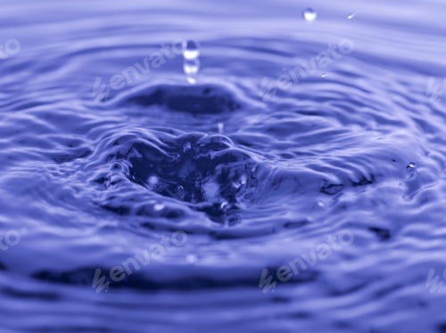 Preview: Water Drop Falling Into Blue Water Abstract Background
