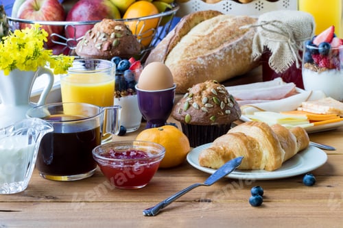 Preview: Front Facing View Of An Arrangement Of Continental Breakfast Foods Against A Sunny Window Ready For