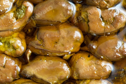Preview: A Very Close View Of Smoked Whole Oysters In Cottonseed Oil.